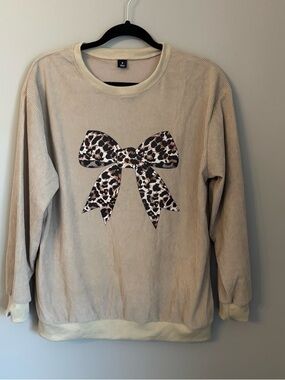 Beige Corded Sweatshirt with Leopard Bow Graphic